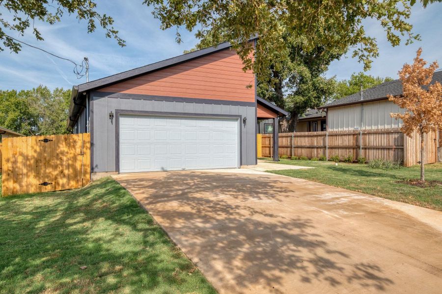 Garage with concrete driveway Garage with concrete driveway