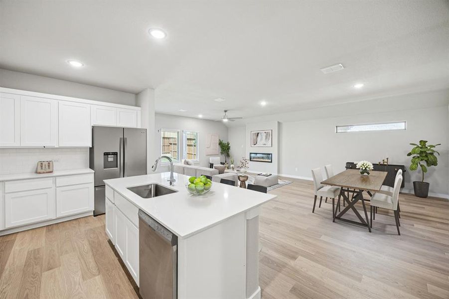 Kitchen in the Oscar home plan by Trophy Signature Homes – REPRESENTATIVE PHOTO Kitchen in the Oscar home plan by Trophy Signature Homes – REPRESENTATIVE PHOTO