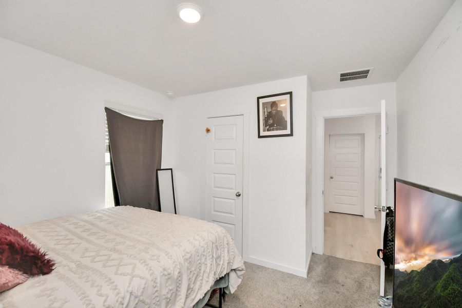 Furnished interior view inside a new home in Post Oak Pointe, Fresno (Image 16).