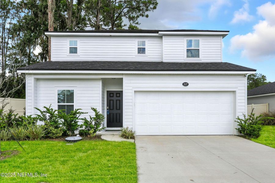 Front exterior of a new home in , Jacksonville, FL, highlighting curb appeal (Image 25).