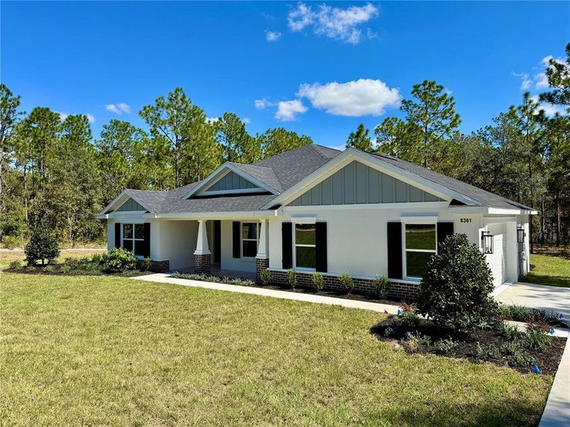 Front exterior of a new home in , Dunnellon, FL, highlighting curb appeal (Image 2). Front exterior of a new home in , Dunnellon, FL, highlighting curb appeal (Image 2).