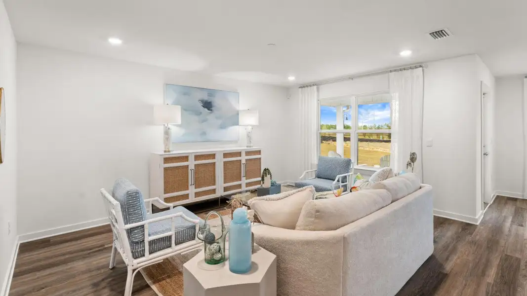 Furnished interior view inside a new home in Magnolia at the Bluffs Phase 3, Freeport (Image 11).