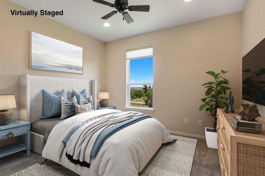 Virtually staged, bedroom 2 features a  beautiful greenbelt view.