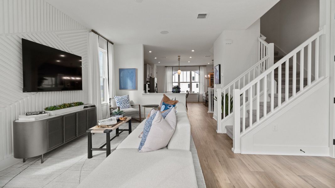 Furnished interior view inside a new home in Parkview at Hamlin, Winter Garden (Image 14).