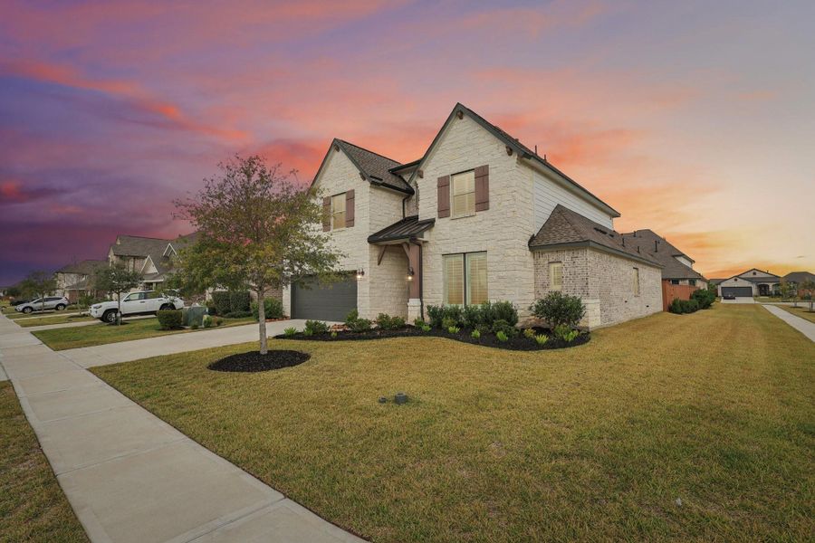 Front exterior of a new home in Lago Mar – 50', La Marque, TX, highlighting curb appeal (Image 25).