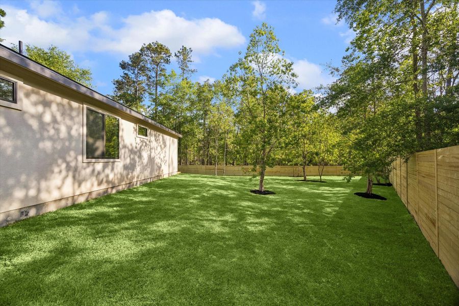 Exterior details and patio area of a home in , Conroe (Image 20).