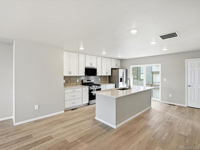 Furnished interior view inside a new home in Three Hills, Morrison (Image 15).