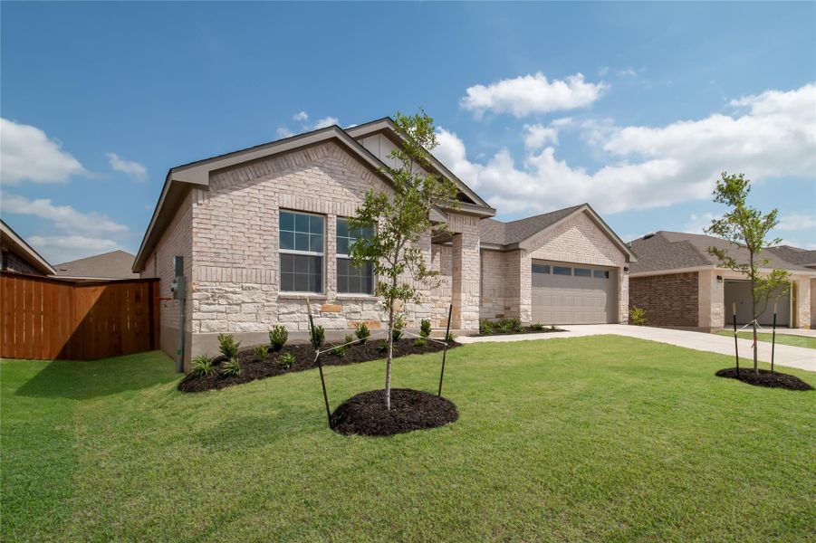 Front exterior of a new home in Riverview, Georgetown, TX, highlighting curb appeal (Image 2). Front exterior of a new home in Riverview, Georgetown, TX, highlighting curb appeal (Image 2).