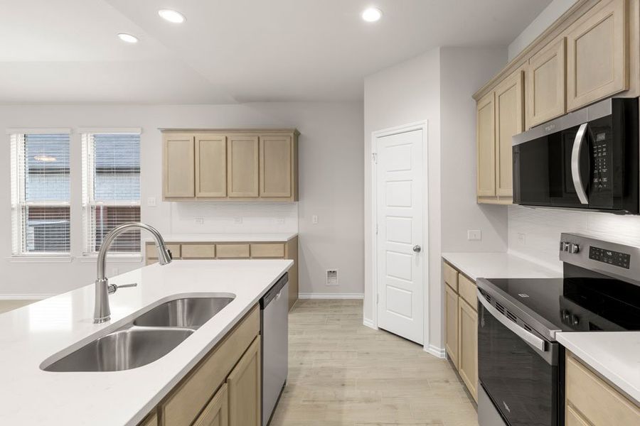 Front exterior of a new home in DeBerry Reserve, Royse City, TX, highlighting curb appeal (Image 13). Front exterior of a new home in DeBerry Reserve, Royse City, TX, highlighting curb appeal (Image 13).