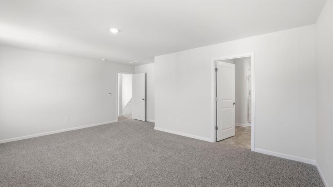 Spacious, unfurnished interior of a new home in Waverly Station, Greenwood (Image 31).