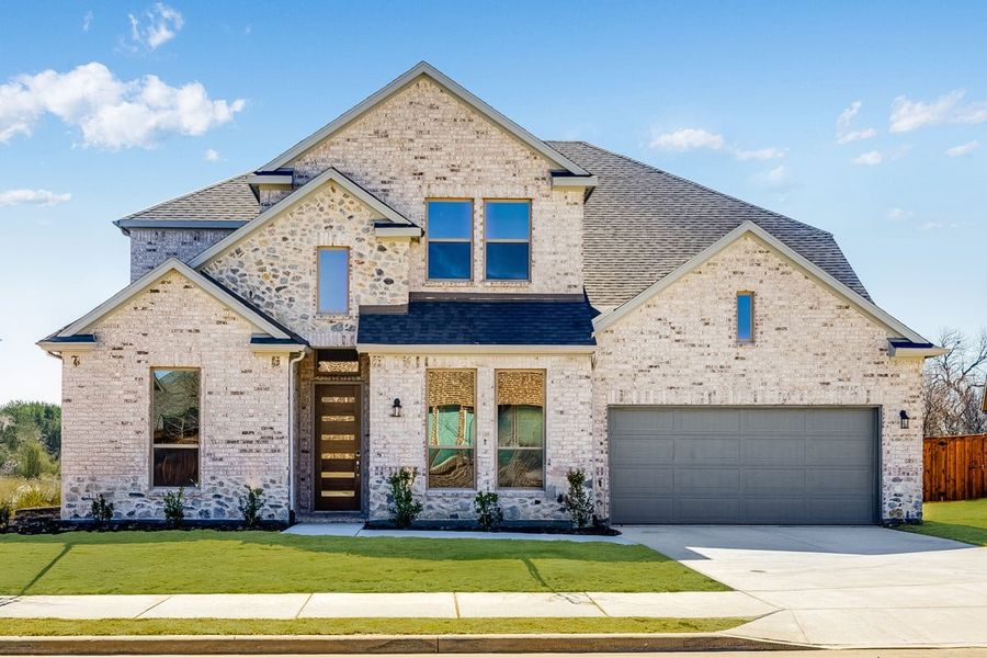 Representative exterior photo of a completed home built from the Topaz by Taylor Morrison in The Ridge at Northlake 60s, Northlake, TX (Image 20). Representative exterior photo of a completed home built from the Topaz by Taylor Morrison in The Ridge at Northlake 60s, Northlake, TX (Image 20).