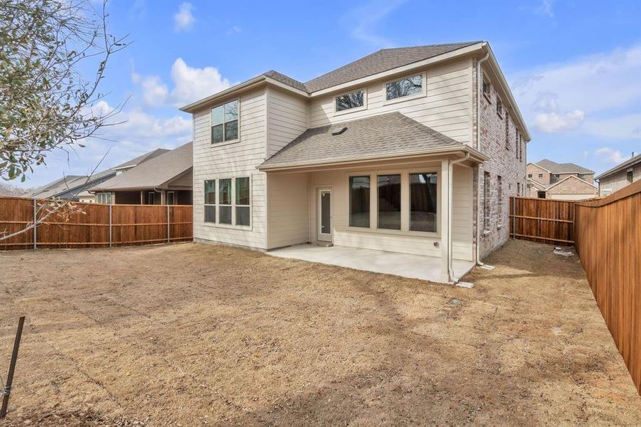 Exterior details and patio area of a home in The Landing at Hidden Lakes, McKinney (Image 4).