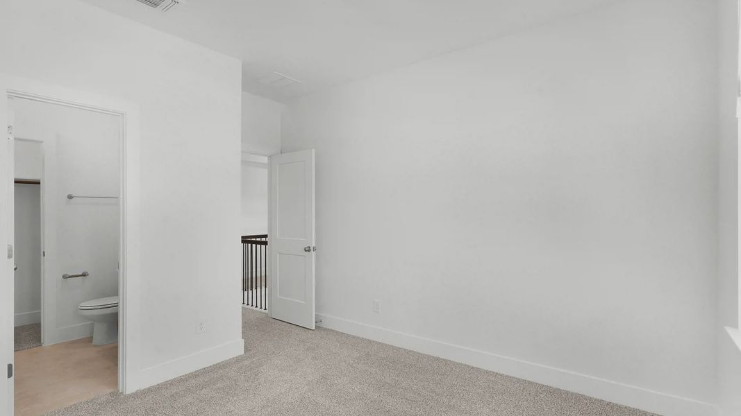 Representative unfurnished interior of a home built from the Archer by Chesmar Homes in Santa Rita Ranch, Liberty Hill (Image 22).