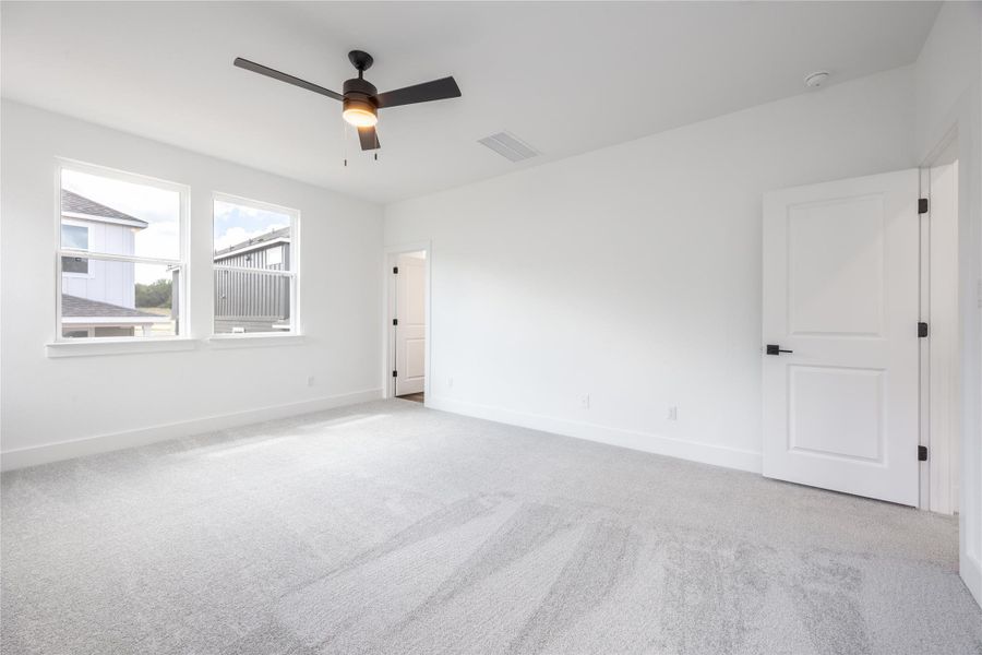 Spacious, unfurnished interior of a new home in Ryegrass Collection – Freedom at Anthem, Kyle (Image 22).