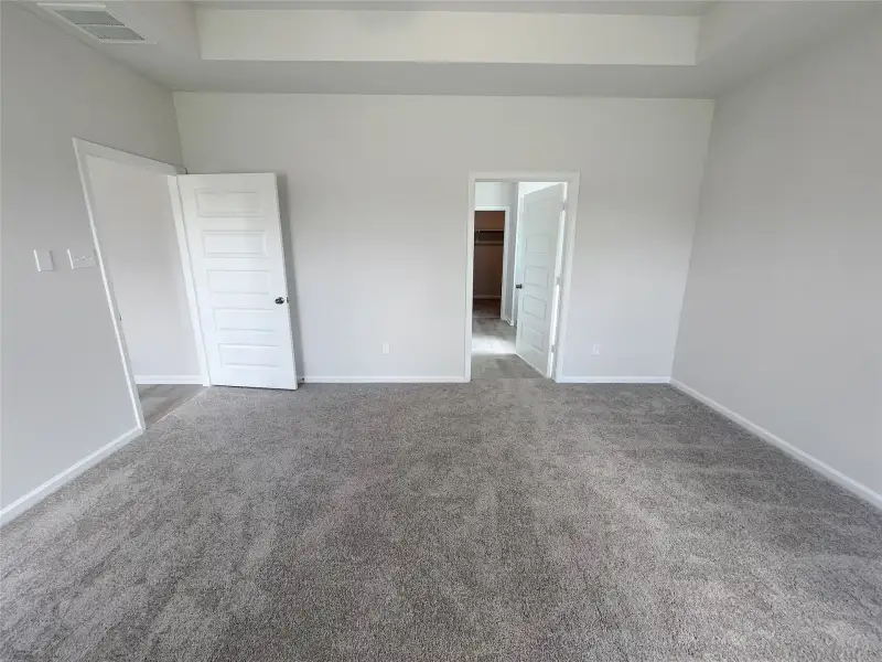 The Georgetown II- Primary Suite. Sample image for illustration; upgrades, options, and colors may vary.