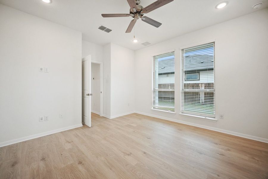 Spacious, unfurnished interior of a new home in The Hills of Bear Creek, Manchaca (Image 16).