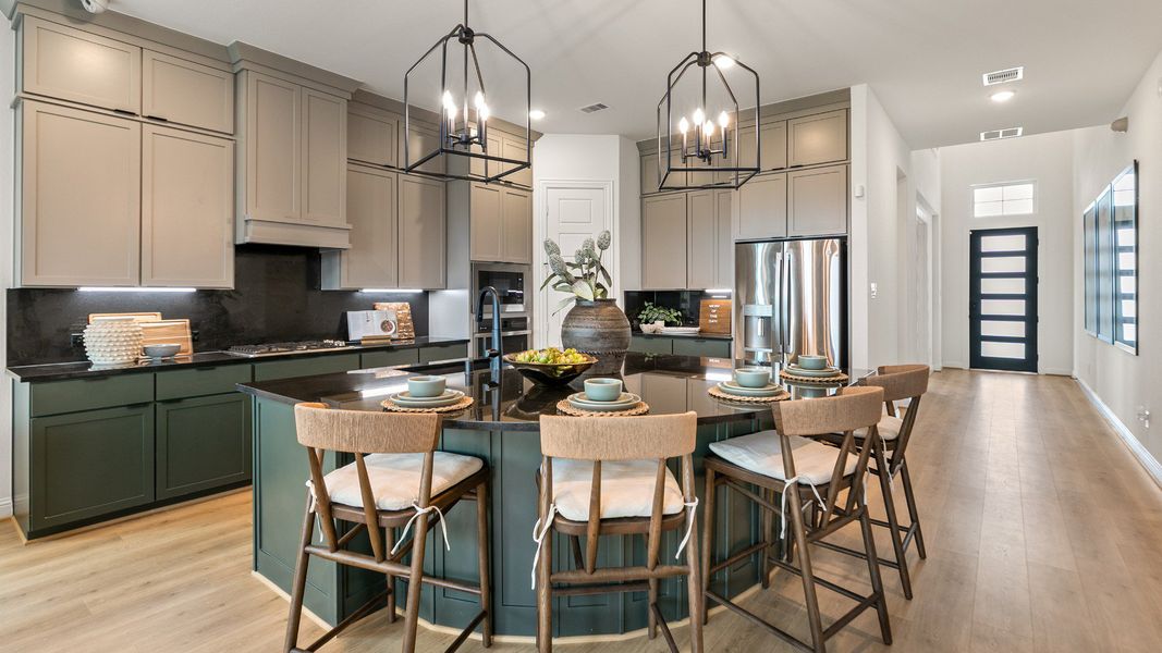 Representative furnished interior of a home built from the Rosewood by Brightland Homes in Sunterra, Katy (Image 9).