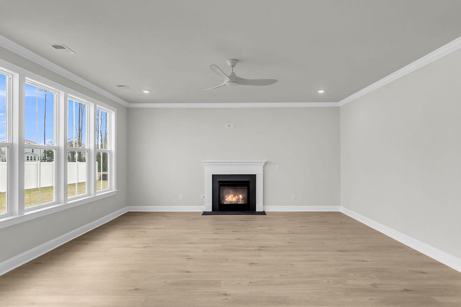 Spacious, unfurnished interior of a new home in Tidewater at Lakes of Cane Bay, Summerville (Image 39).