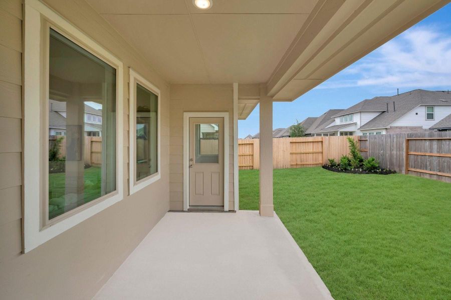 Relax outdoors on the covered patio Relax outdoors on the covered patio