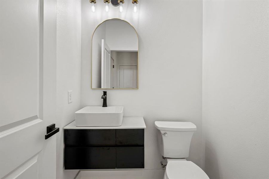 Bathroom with vanity and toilet