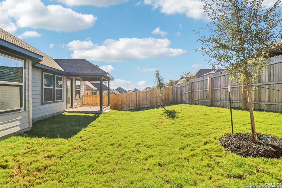 Exterior details and patio area of a home in Arcadia Ridge - Classic Series, San Antonio (Image 28).