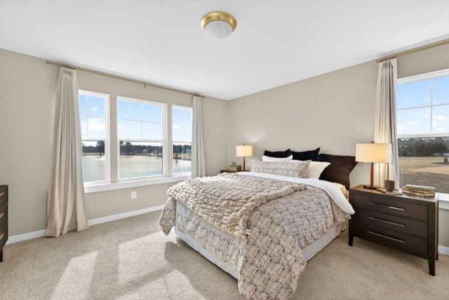 Representative furnished interior of a home built from the Hollis TH by True Homes in North District at Flowers Plantation Townhomes, Clayton (Image 11).