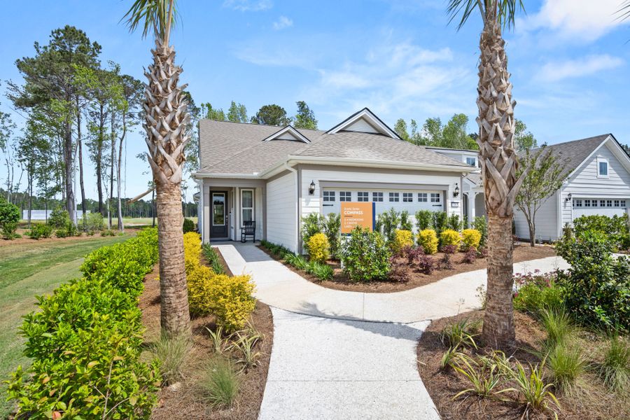 Front exterior of a new home in Del Webb Savannah at Heartwood, Richmond Hill, GA, highlighting curb appeal (Image 23). Front exterior of a new home in Del Webb Savannah at Heartwood, Richmond Hill, GA, highlighting curb appeal (Image 23).