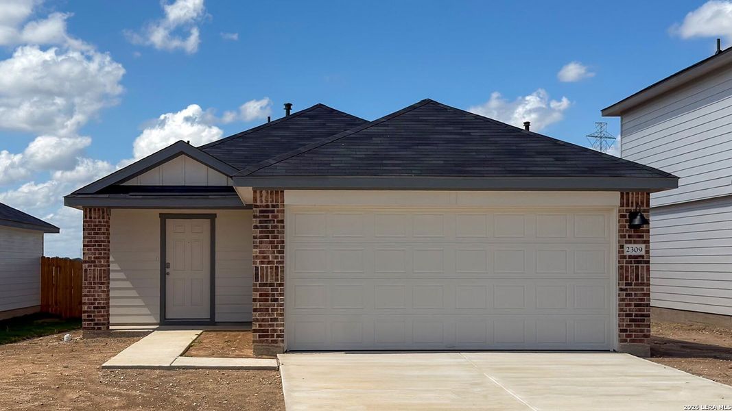 Front exterior of a new home in Lantana, Lockhart, TX, highlighting curb appeal (Image 1). Front exterior of a new home in Lantana, Lockhart, TX, highlighting curb appeal (Image 1).