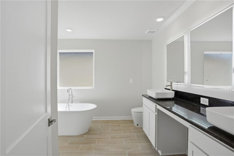 Furnished interior view inside a new home in Crossvine Village, LaGrange (Image 8).