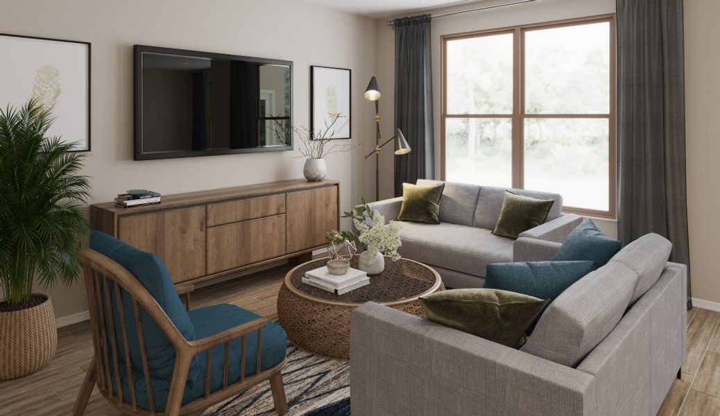 A living room with a couch and a table.