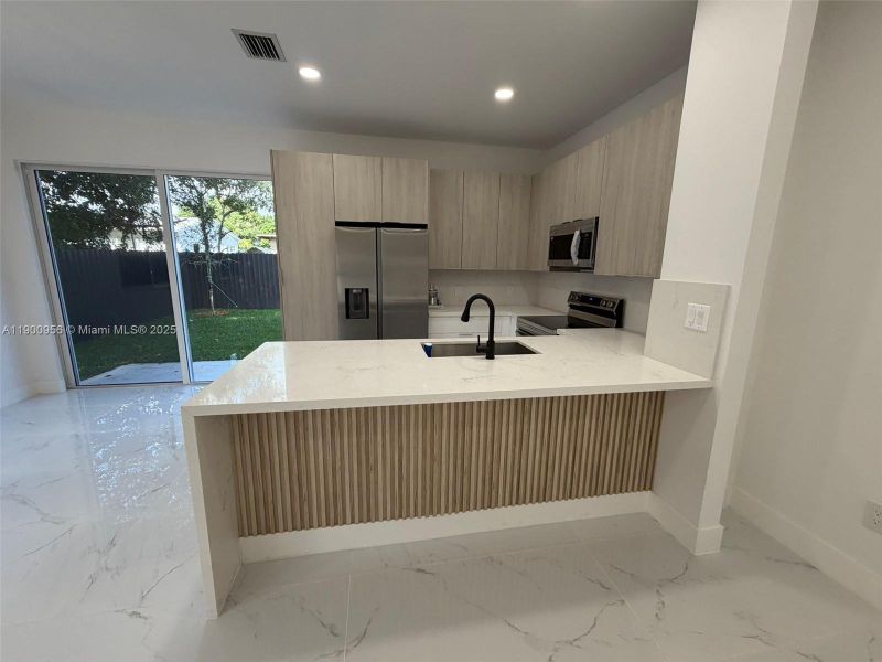 Furnished interior view inside a new home in , Miami (Image 10). Furnished interior view inside a new home in , Miami (Image 10).