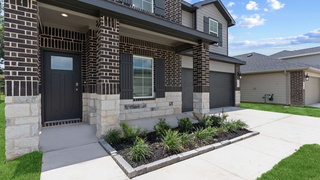 Exterior details and patio area of a home in Tamarron, Fulshear (Image 2). Exterior details and patio area of a home in Tamarron, Fulshear (Image 2).