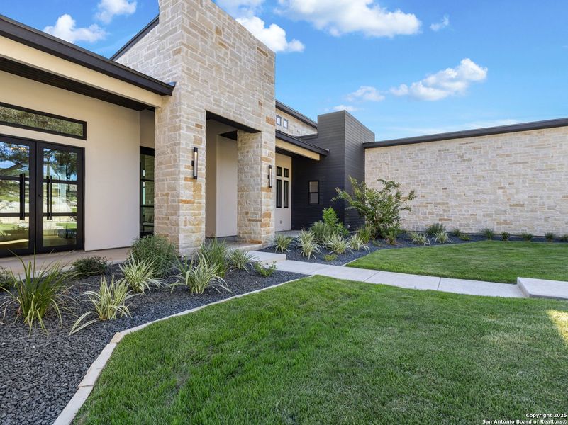 Front exterior of a new home in , Canyon Lake, TX, highlighting curb appeal (Image 20). Front exterior of a new home in , Canyon Lake, TX, highlighting curb appeal (Image 20).