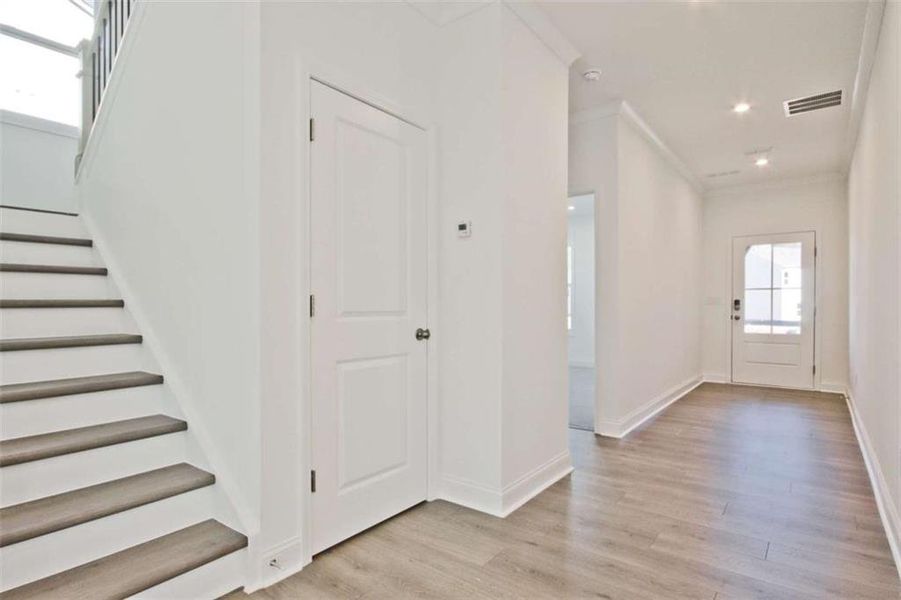 Spacious, unfurnished interior of a new home in The Paddocks at Doc Hughes, Buford (Image 34).