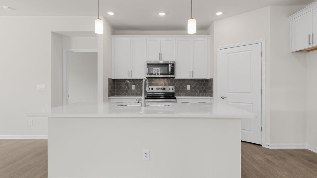 Furnished interior view inside a new home in The Villas at Kinsley, Jamestown (Image 7).