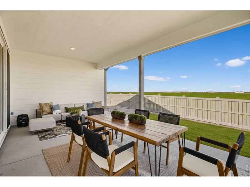 Exterior details and patio area of a home in Farmstead, Berthoud (Image 21).