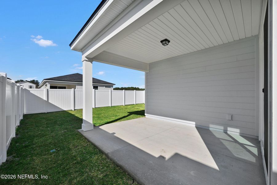 Exterior details and patio area of a home in Murray Farms, Middleburg (Image 3).