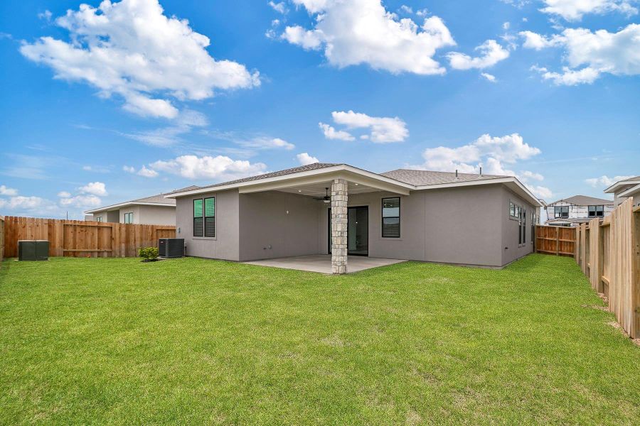 Exterior details and patio area of a home in Hallimore Ranch, Rosenberg (Image 2). Exterior details and patio area of a home in Hallimore Ranch, Rosenberg (Image 2).