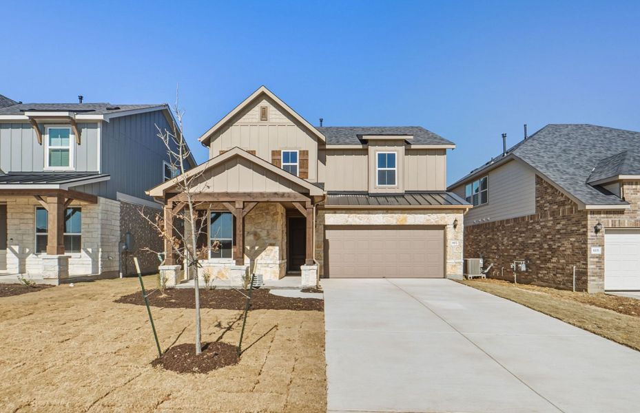 Front exterior of a new home in Sunfield, Buda, TX, highlighting curb appeal (Image 20).