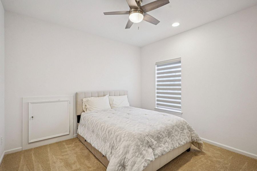 Furnished interior view inside a new home in Sienna, Missouri City (Image 29).