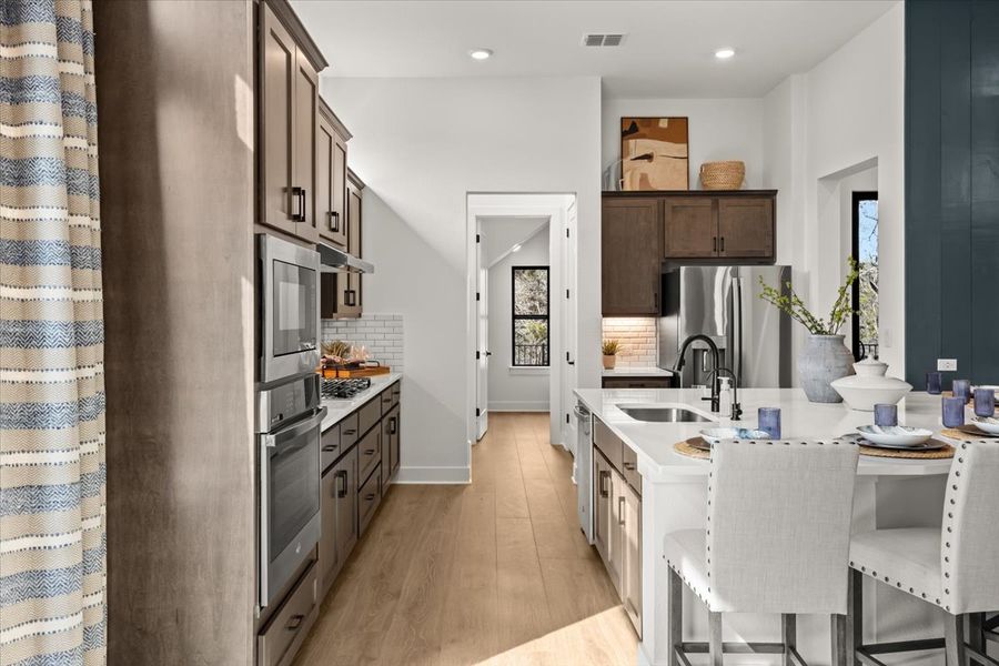 Furnished interior view inside a new home in 6 Creeks, Kyle (Image 36).