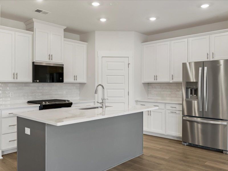 Furnished interior view inside a new home in The Coves at Lakes of Cane Bay, Summerville (Image 8).