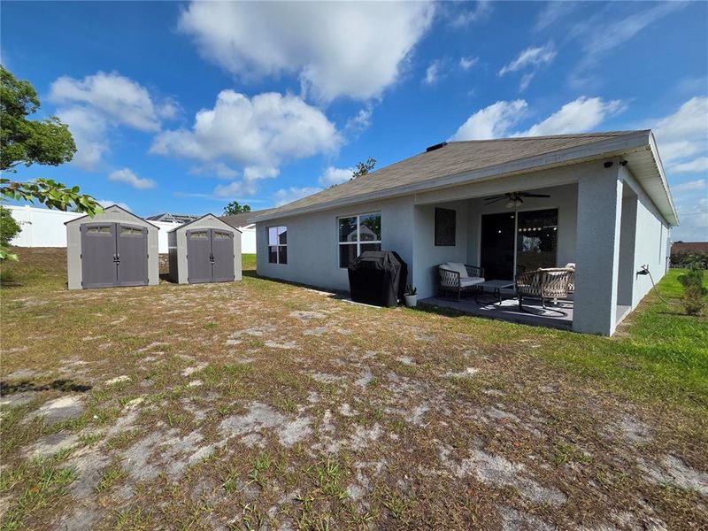 Exterior details and patio area of a home in Hernando County Spot Lots, Spring Hill (Image 25).