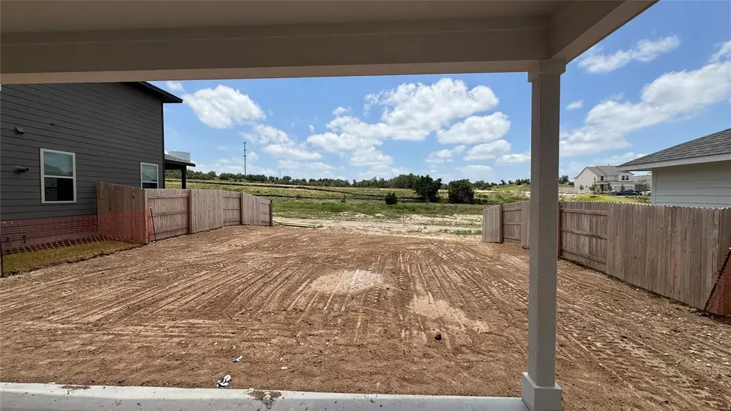 Exterior details and patio area of a home in Cannon Ranch, Dripping Springs (Image 3).