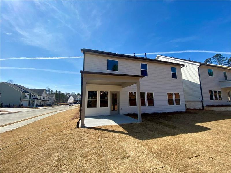 Exterior details and patio area of a home in Arbors at Richland Creek, Buford (Image 3).