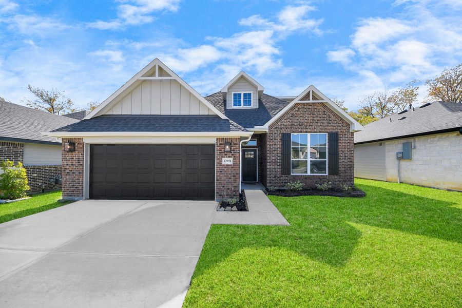Front exterior of a new home in Lexington Heights, Willis, TX, highlighting curb appeal (Image 27).