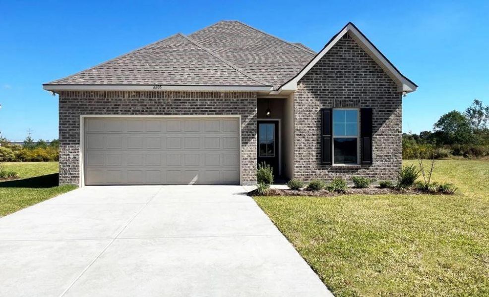 Front exterior of a new home in Orange Gardens, Orange, TX, highlighting curb appeal (Image 2).