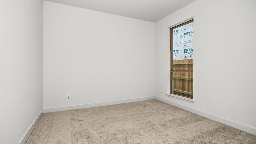 Spacious, unfurnished interior of a new home in Lakes of Cane Island, Katy (Image 23).