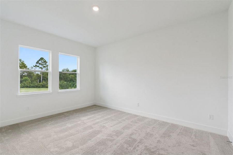 Spacious, unfurnished interior of a new home in Northlake At Ovation, Winter Garden (Image 17).