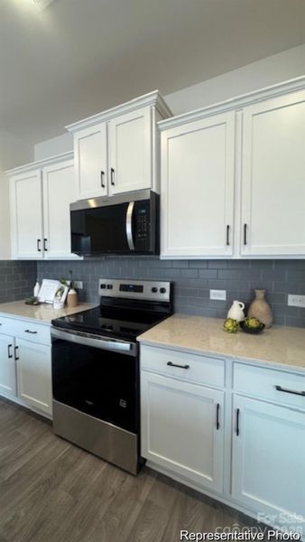 Furnished interior view inside a new home in Clark Village Townhomes, Charlotte (Image 10).